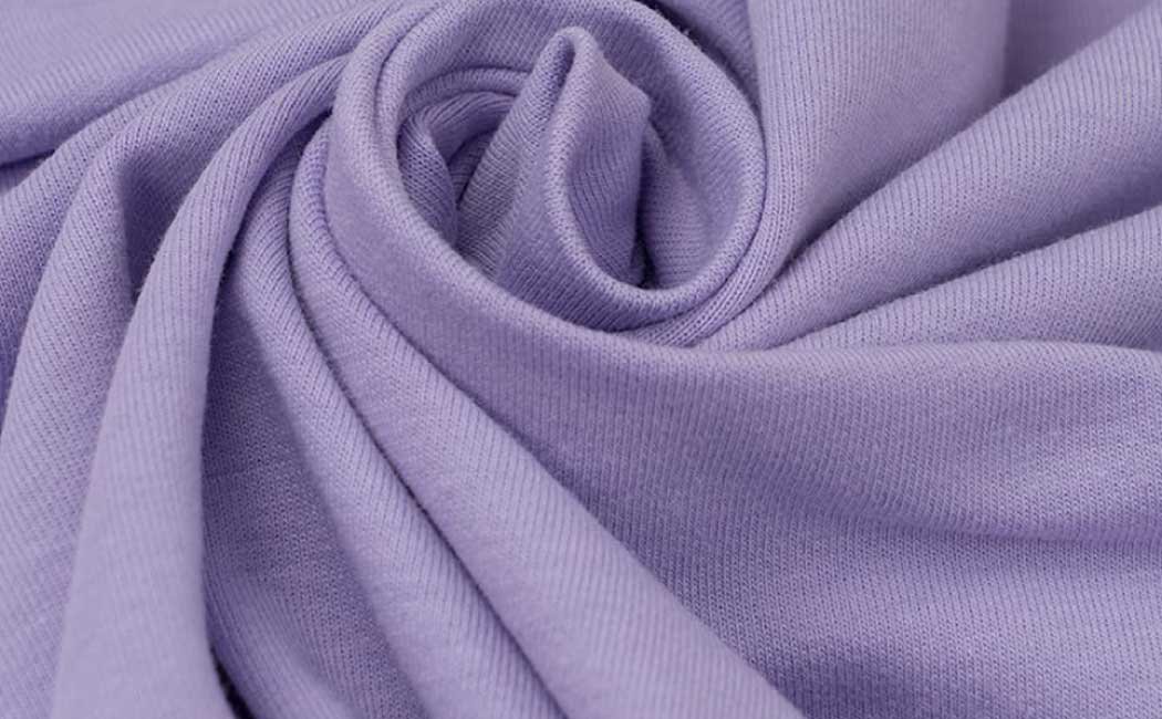 Soft colorful fleece fabric rolls in various colors and patterns